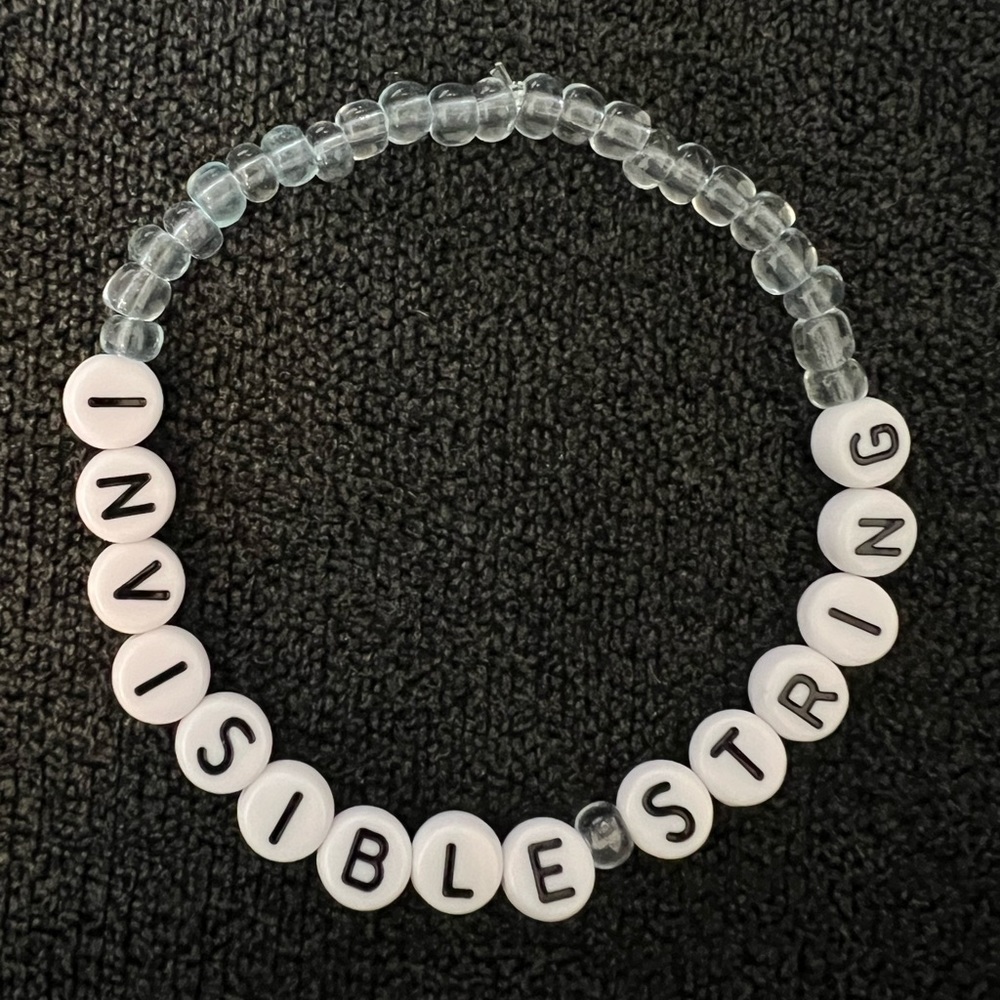 Taylor Swift invisible string friendship bracelet
